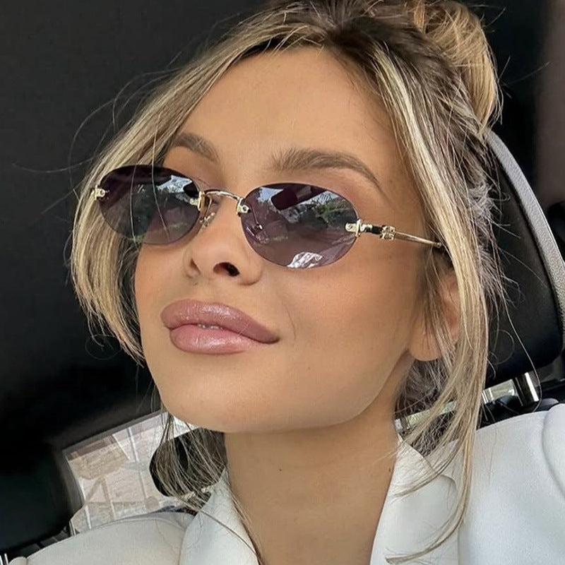 New Oval Rimless Glasses with a Retro Design And a Stylish Concave Shape